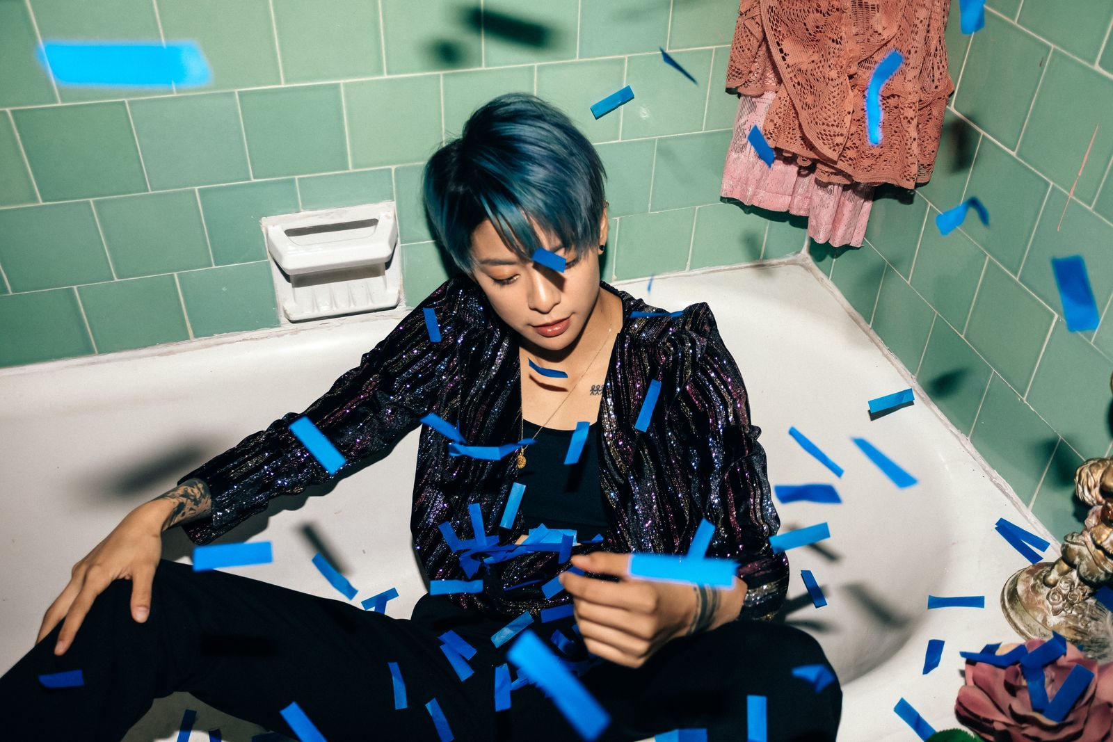 Amber Liu tattoos: arm coverage and chest marks in a closer contextual portrait