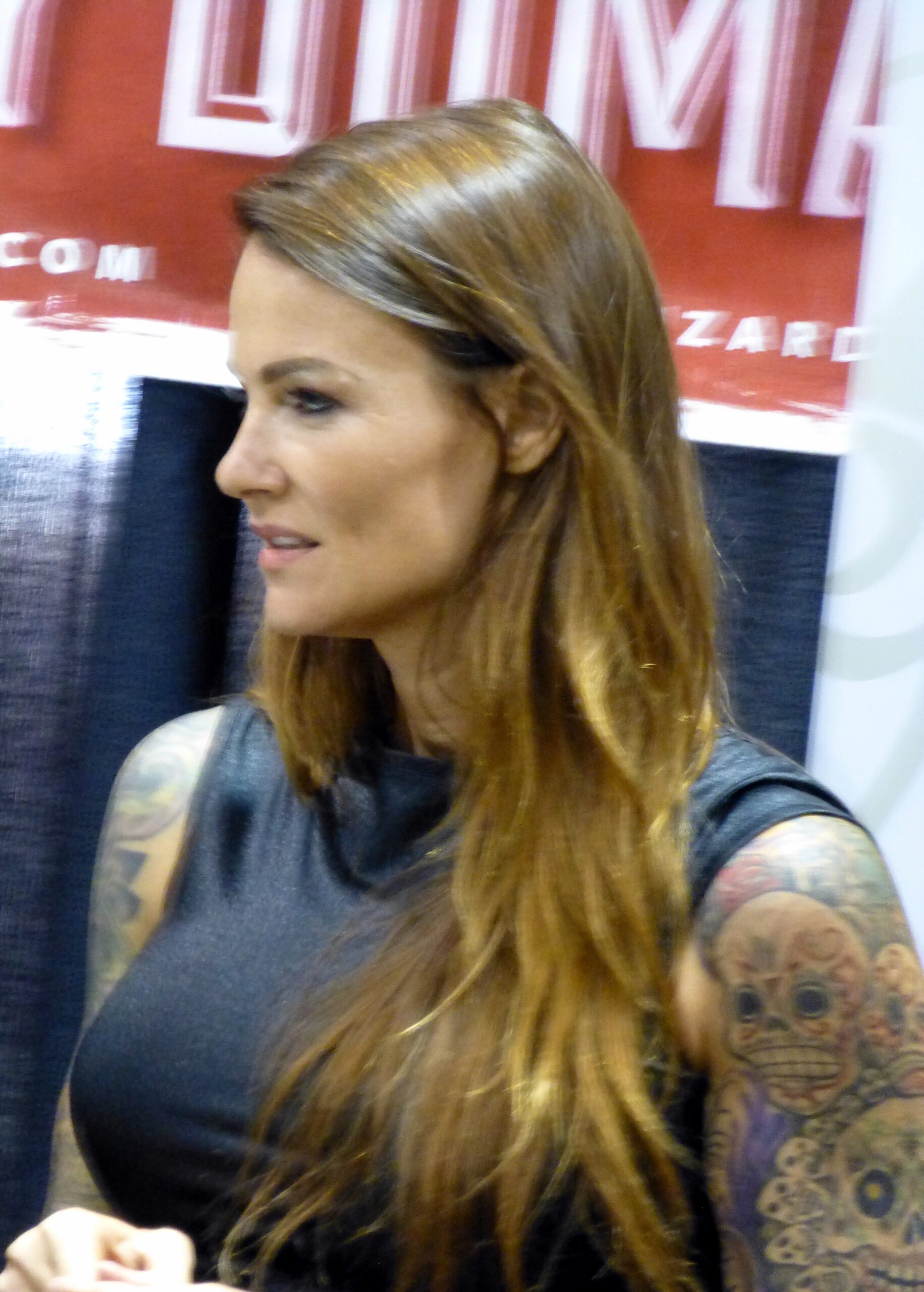 Amy Dumas Left Arm Sleeve Tattoos