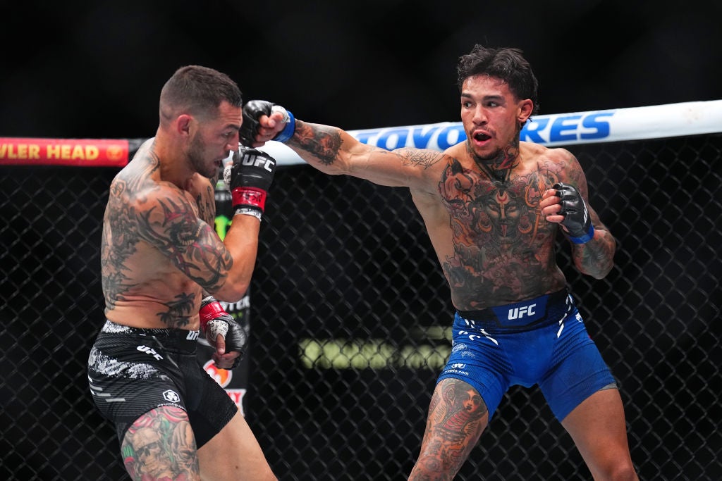 Andre Fili The central chest face Andre Fili tattoos: The central chest face