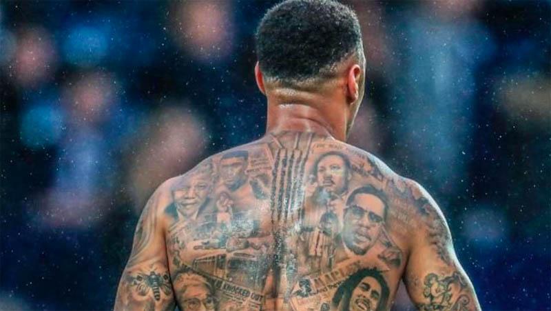 Andre Gray tattoos: upper-back portrait detail
