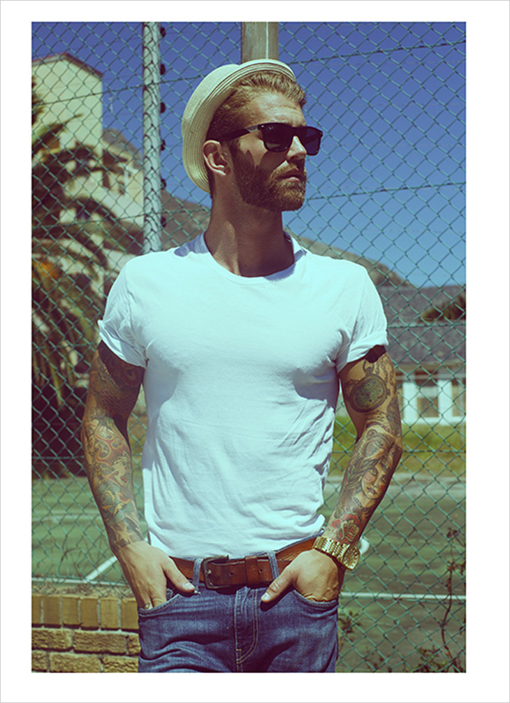 Andre Hamann tattoos: Andre Hamann flowers on his left forearm