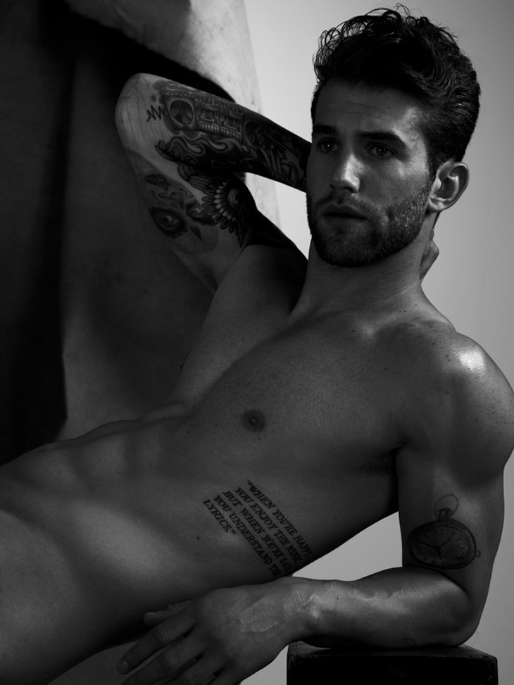 Andre Hamann tattoos: Andre Hamann compact uppercase lettering on his left ribs