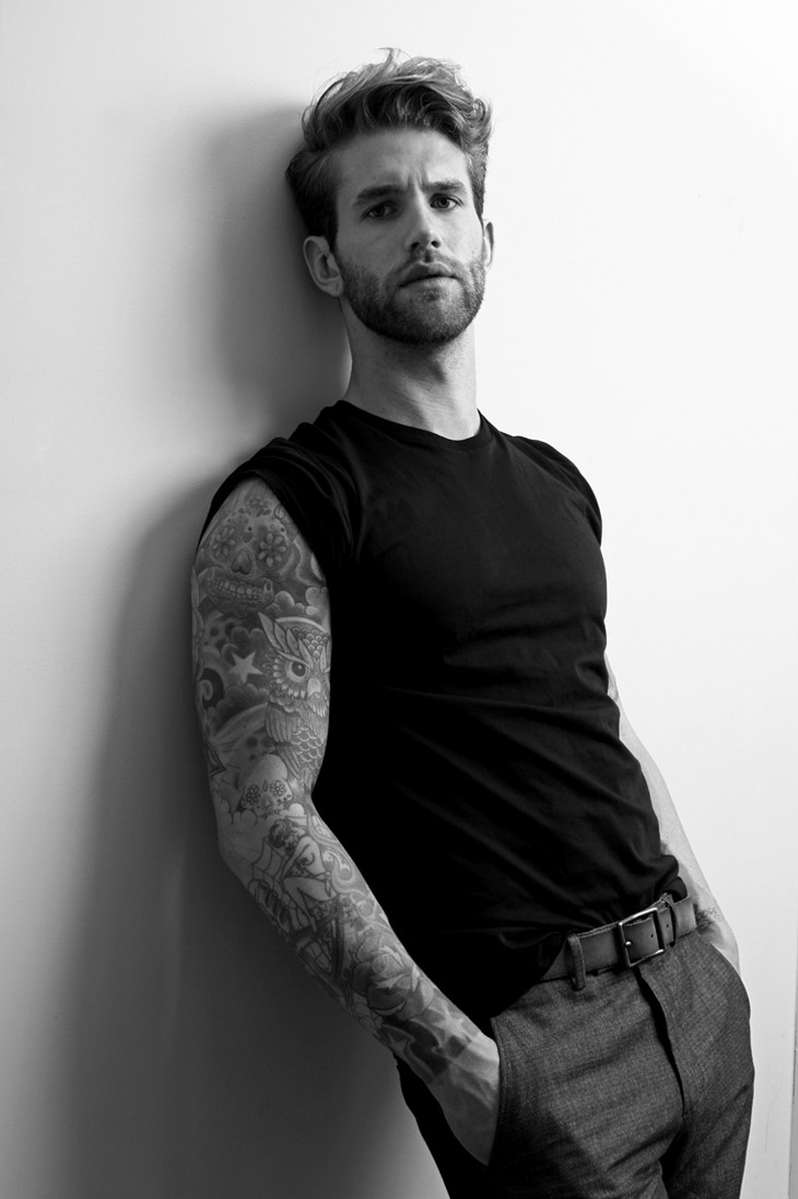 Andre Hamann tattoos: Andre Hamann right upper-arm owl tattoo