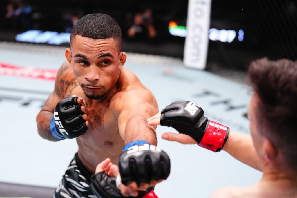 Andre Lima in a contextual photograph: Life inside the Octagon; not tattoo evidence