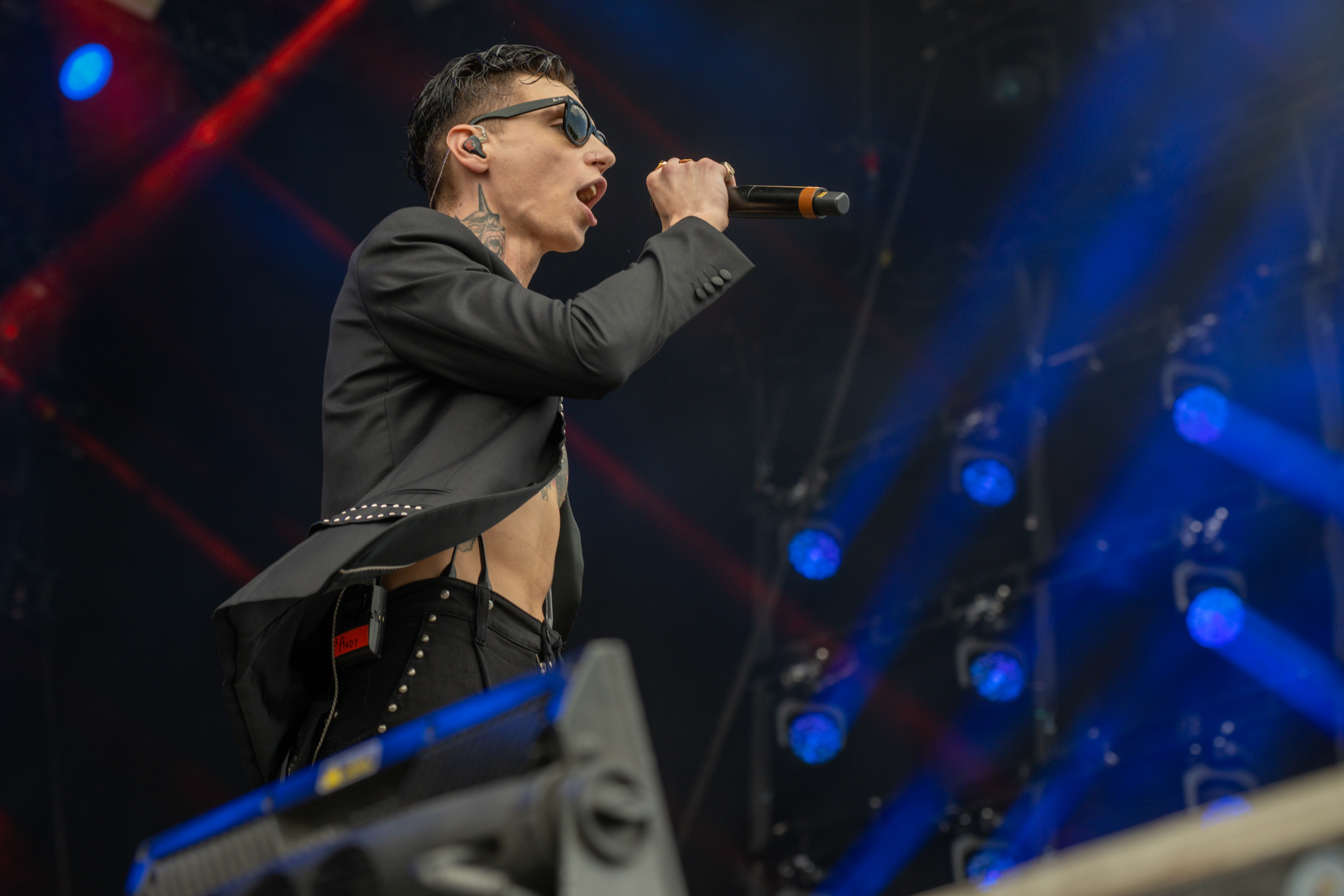 Andy Biersack side neck and torso tattoos