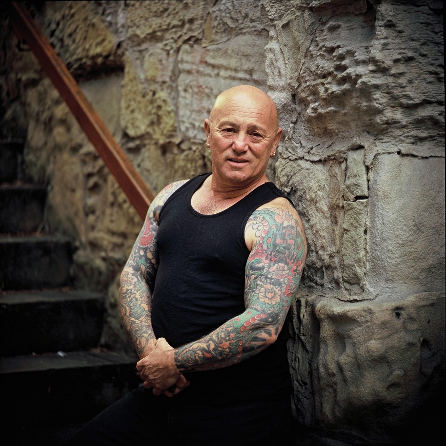 Angry Anderson tattoos: Genuine subject-matched tattoo photograph used in the matching article section.