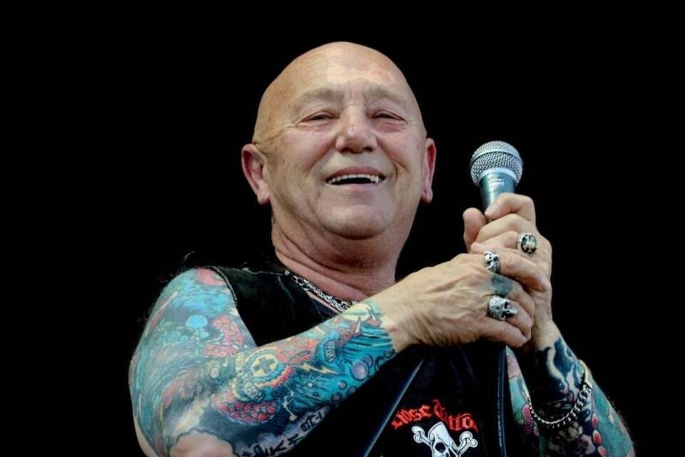 Angry Anderson tattoos: Genuine subject-matched tattoo photograph used in the matching article section.