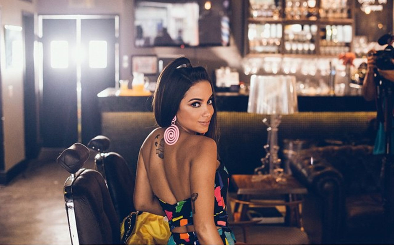 Anitta tattoos: Additional back and shoulder tattoo context