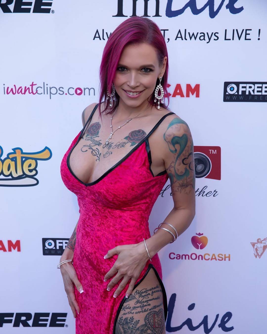 Chest Script Roses tattoo photograph of Anna Bell Peaks Anna Bell Peaks tattoos: chest script roses on Anna Bell Peaks