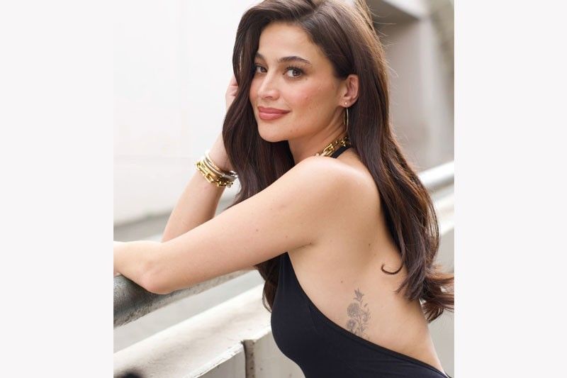 Anne Curtis tattoos: second published view of the left-rib flower tattoo