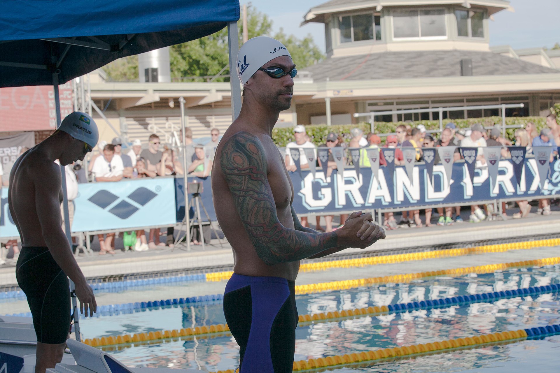 Anthony Ervin tattoos: Tattoo evidence: full upper-body view showing both sleeves and layered color.