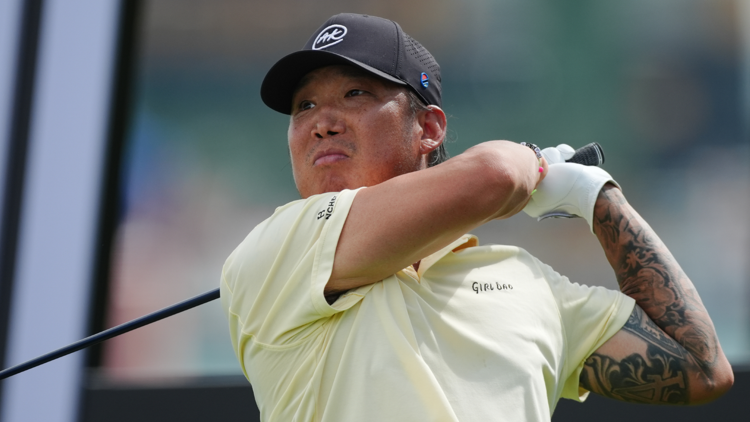 Anthony Kim tattoos: close view of the black and grey sleeve