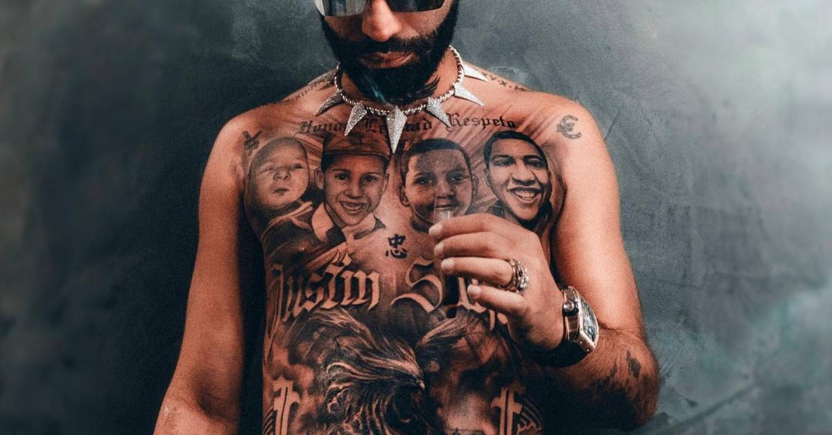Arcángel tattoos: Tattoo evidence: close torso crop showing memorial portraits, lettering and shading.