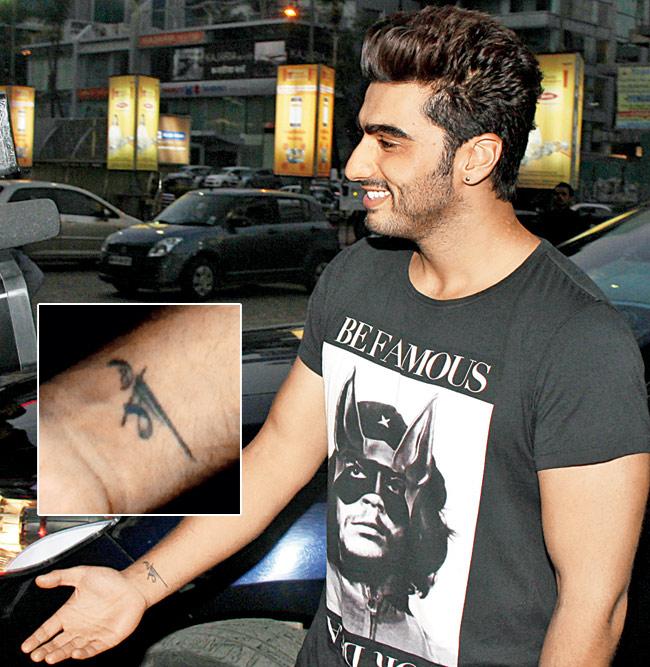 Arjun Kapoor Genuine tattoo evidence for the Hindi wrist tribute and number detail. Arjun Kapoor tattoos: Genuine tattoo evidence for the Hindi wrist tribute and number detail.