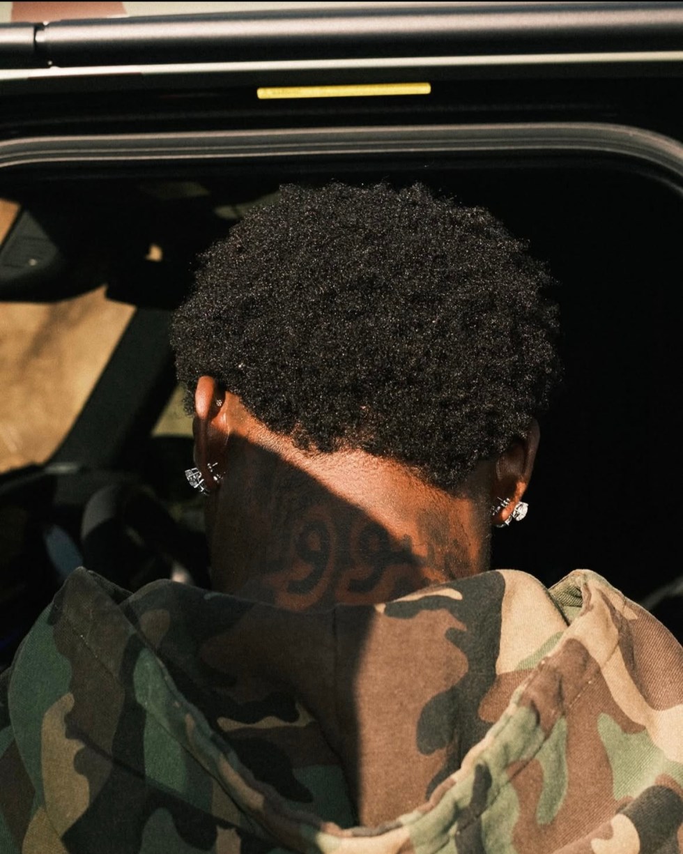 Asake tattoos: Inline image 3 for the section headed Why Asake’s neck tattoo uses his own name; genuine tattoo evidence.