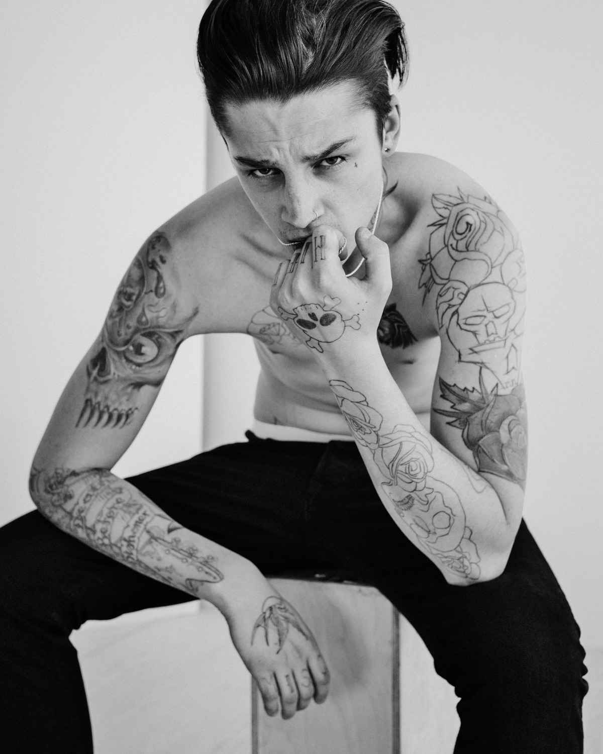 Ash Stymest hand skull and crossbones tattoos