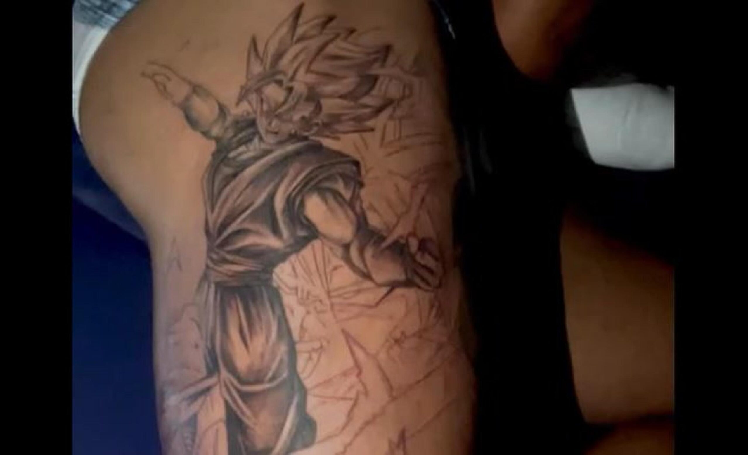 Pierre-Emerick Aubameyang Goku and Gohan thigh tattoo Pierre-Emerick Aubameyang tattoos: Goku and Gohan on the right thigh