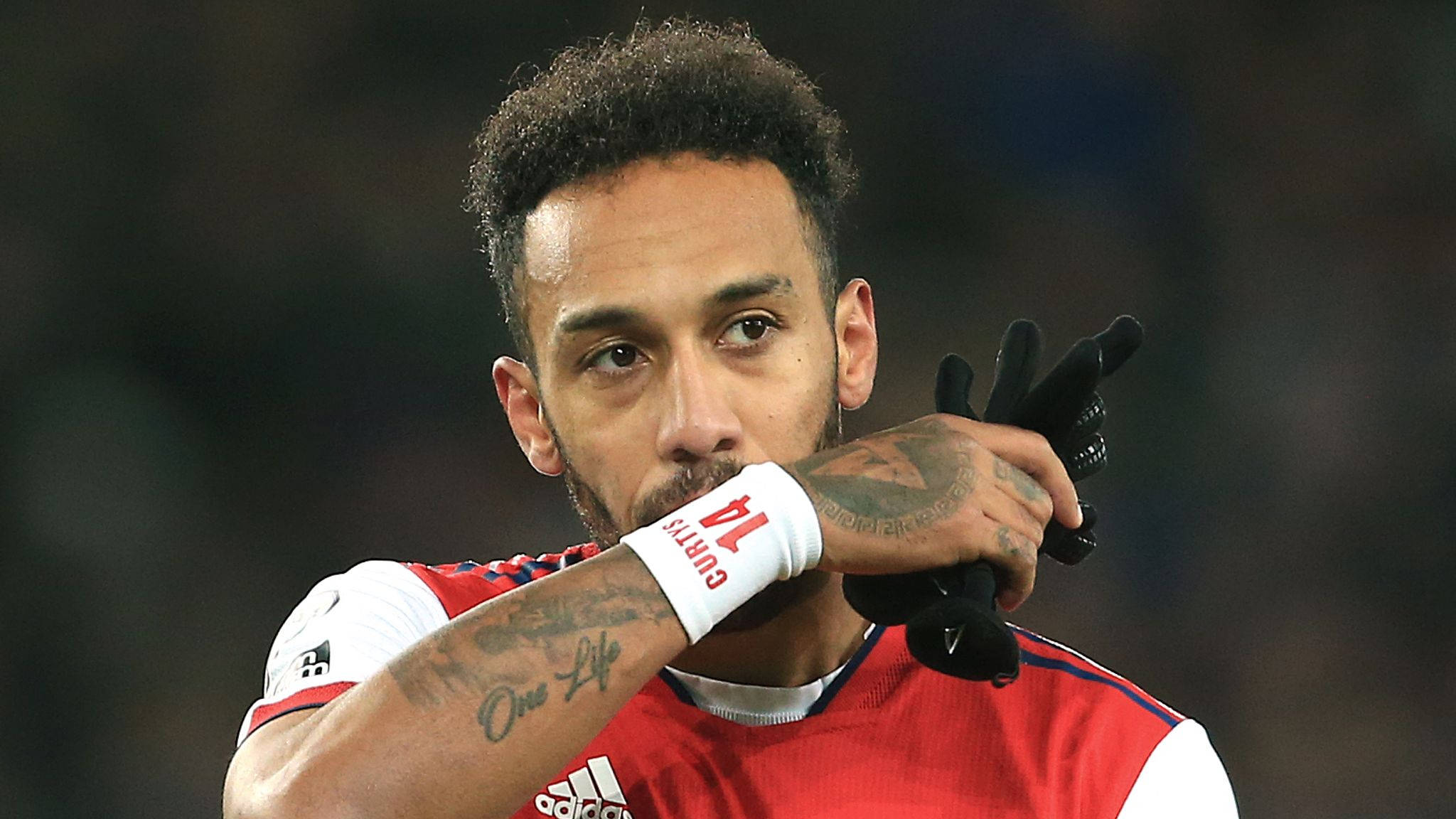 Pierre-Emerick Aubameyang One Life forearm tattoo Pierre-Emerick Aubameyang tattoos: Names and script across the torso