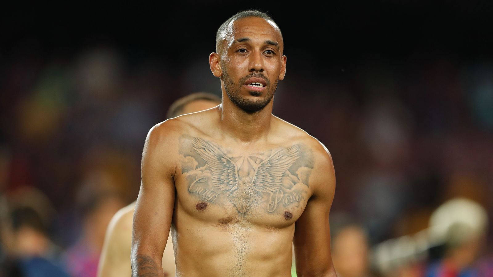 Pierre-Emerick Aubameyang winged chest tattoo Pierre-Emerick Aubameyang tattoos: The winged chest design