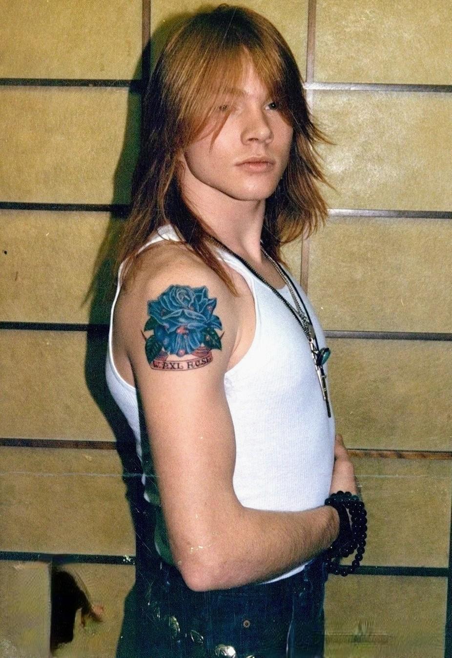Axl Rose young black rose tattoo