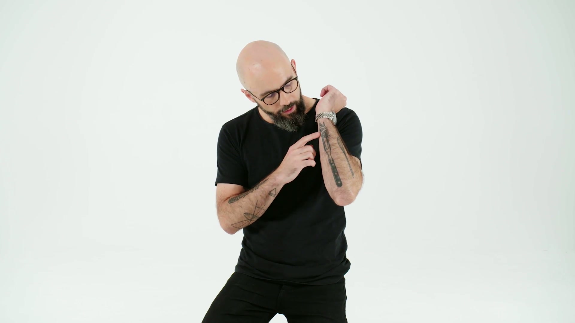 Babish tattoos: mid-shot of the mixed tattoo collection as a visual scrapbook