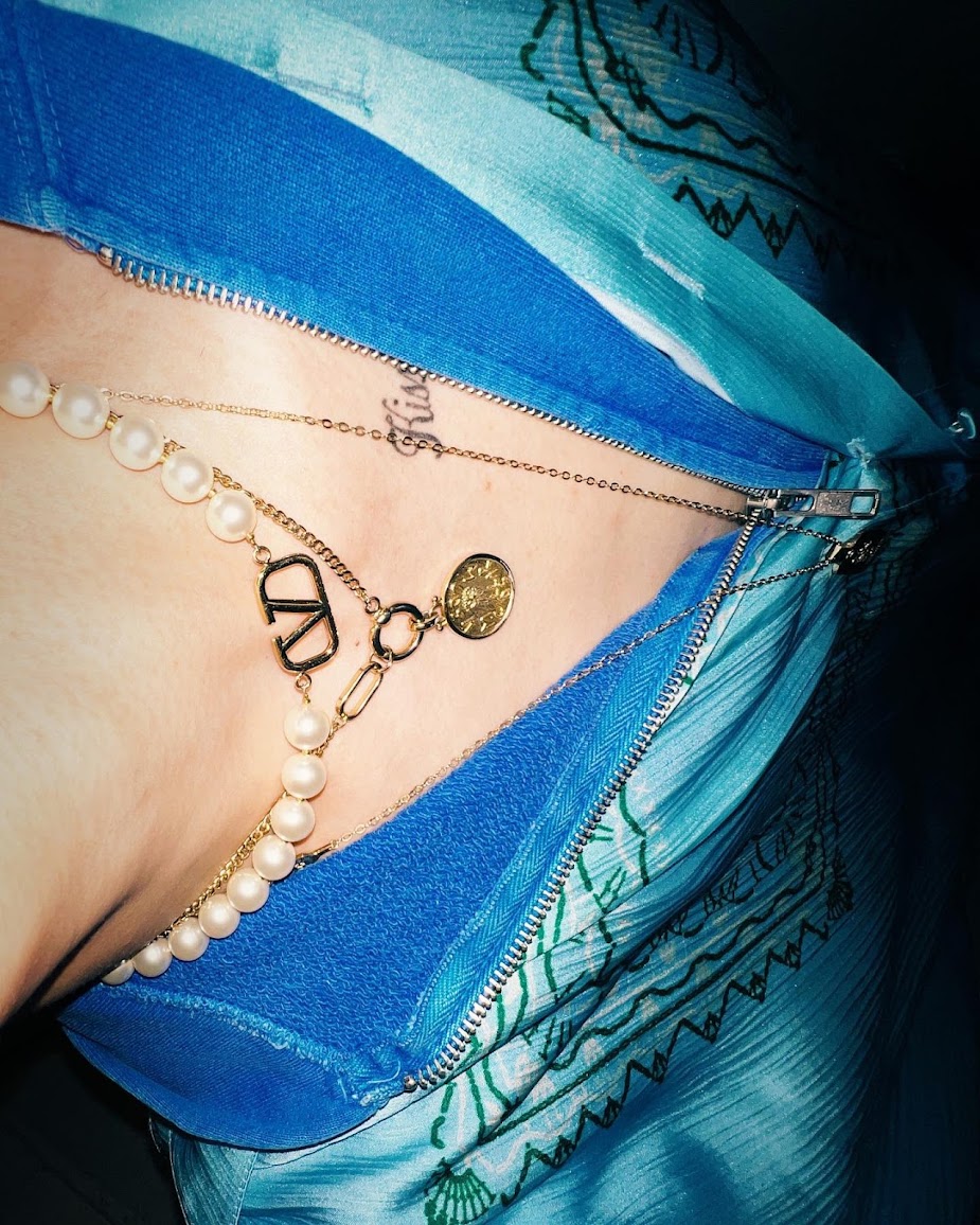 BamBam tattoos: Kissin On My Tattoos collarbone script
