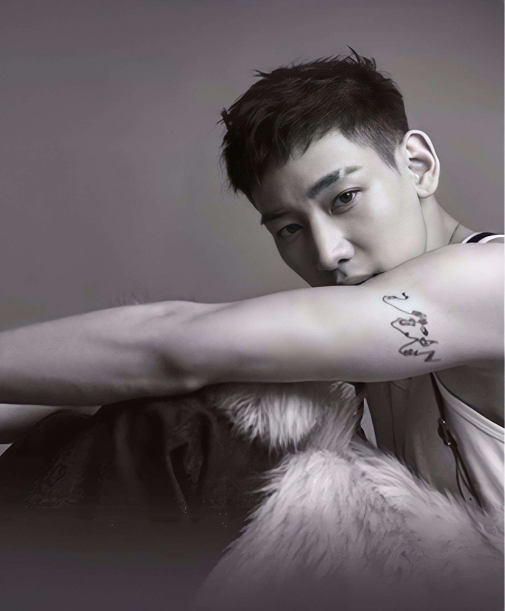 BamBam tattoos: upper arm linework and faces tattoo