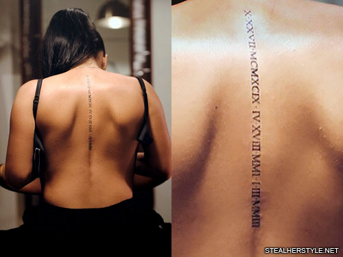 Becky G tattoos: Roman numerals running down her spine