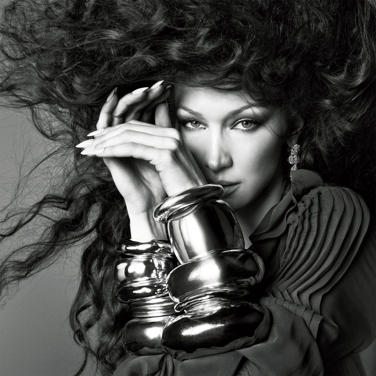 Bella Hadid in a contextual photograph: Bella Hadid British Vogue portrait; not tattoo evidence