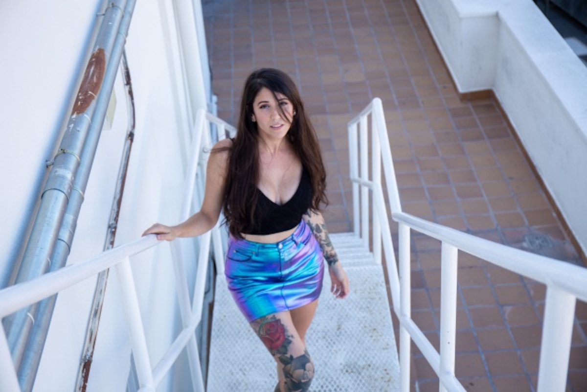 Bely Basarte in a contextual photograph: Bely Basarte tattoo article inline image; not tattoo evidence
