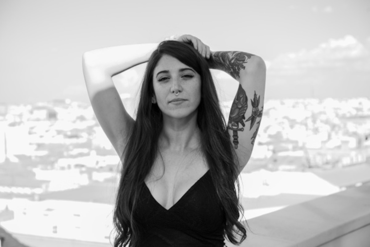 Bely Basarte in a contextual photograph: Bely Basarte tattoo article inline image; not tattoo evidence