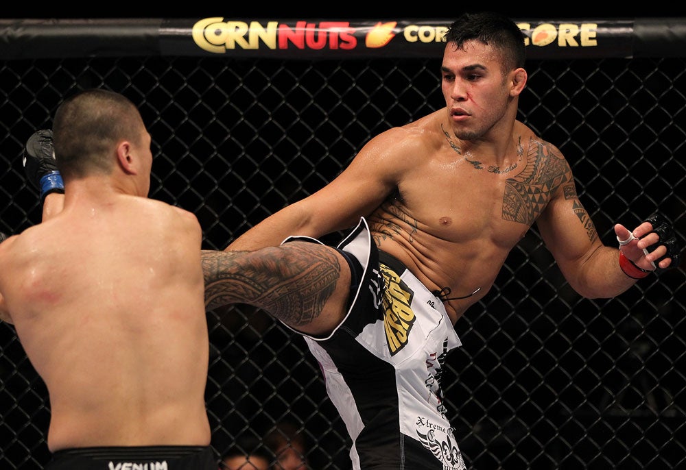 Brad Tavares tattoos: The tattoos in an earlier competition photo