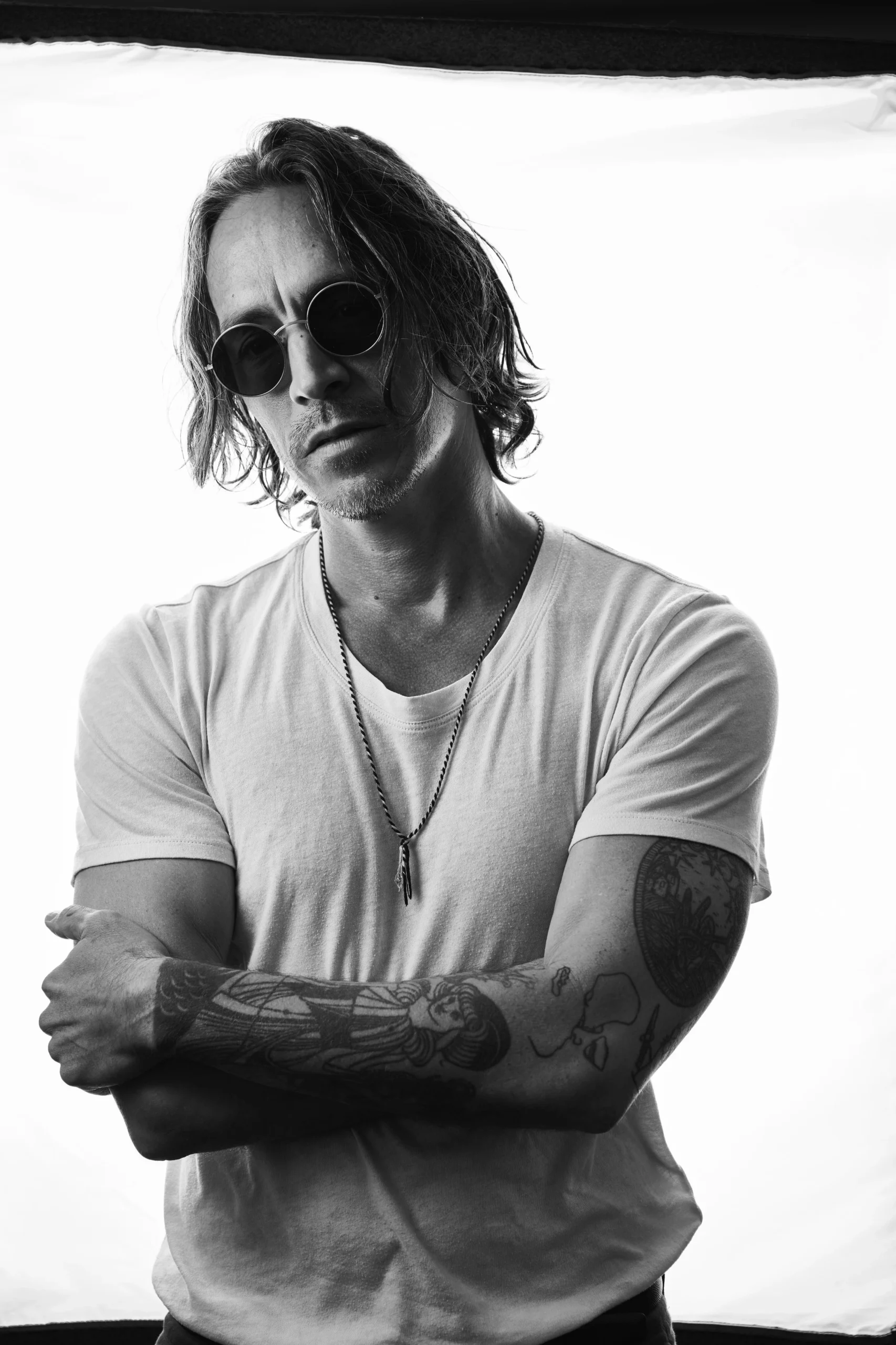 Brandon Boyd tattooed arms portrait