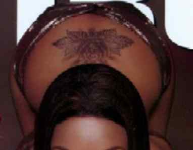 Brandy Norwood tattoos: genuine tattoo reference for the matching section