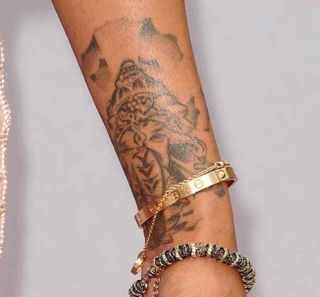Brandy Norwood tattoos: genuine tattoo reference for the matching section