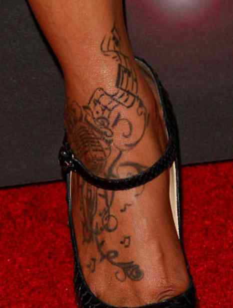 Brandy Norwood tattoos: genuine tattoo reference for the matching section