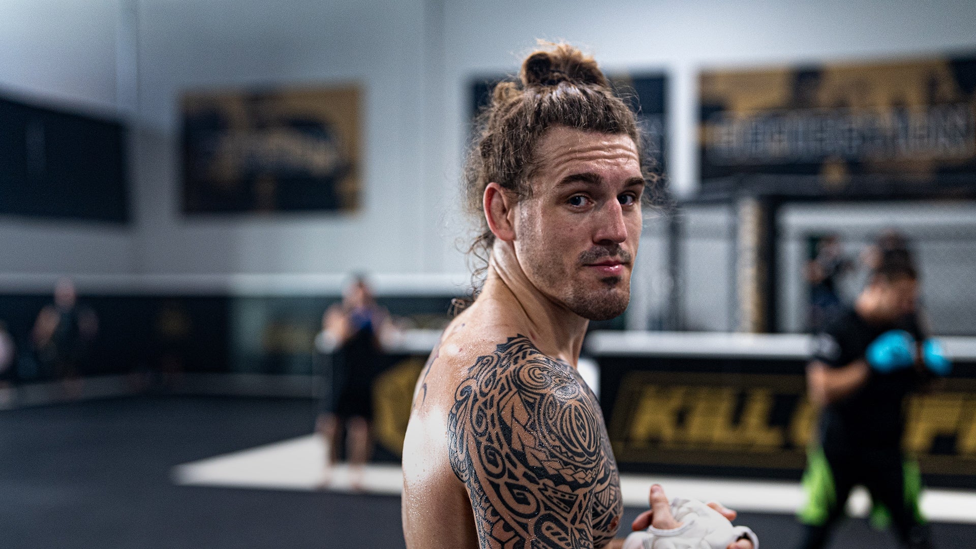 Brendan Allen tattoos: The blackwork around his right shoulder