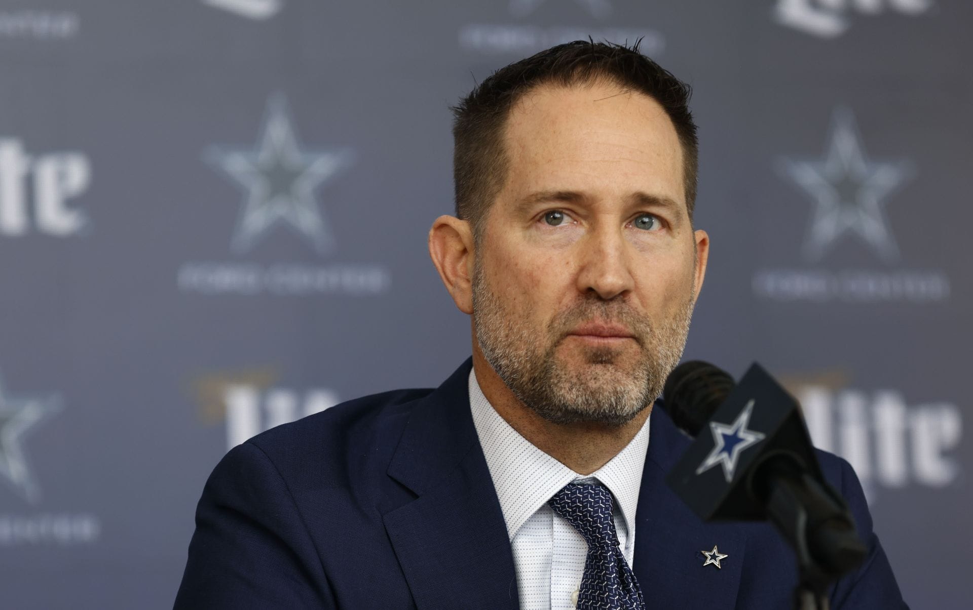 Brian Schottenheimer Cowboys press portrait Brian Schottenheimer in a contextual photograph: Brian Schottenheimer contextual portrait; not tattoo evidence