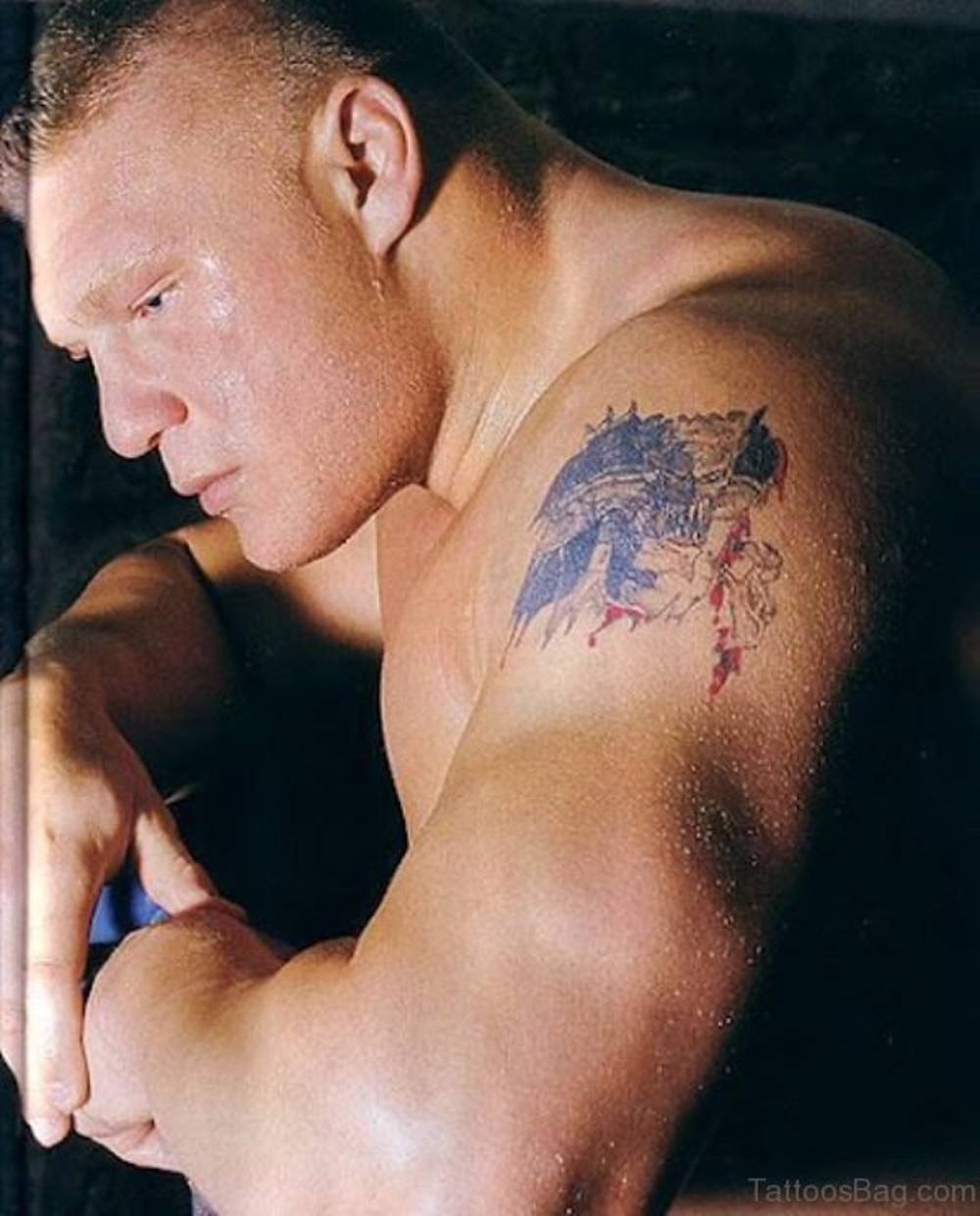 Brock Lesnar's Yautja Predator tattoo on his left arm