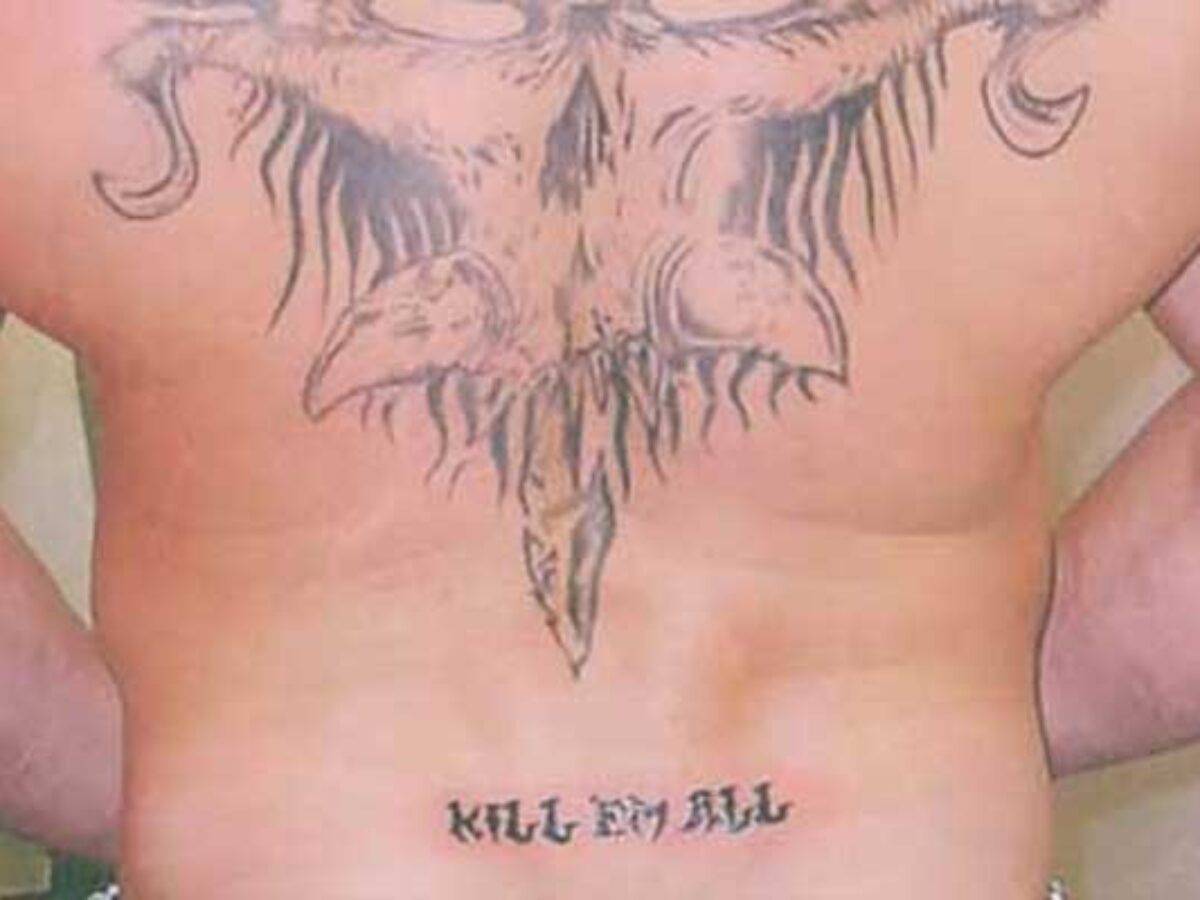 Brock Lesnar's Kill Em All lower-back tattoo