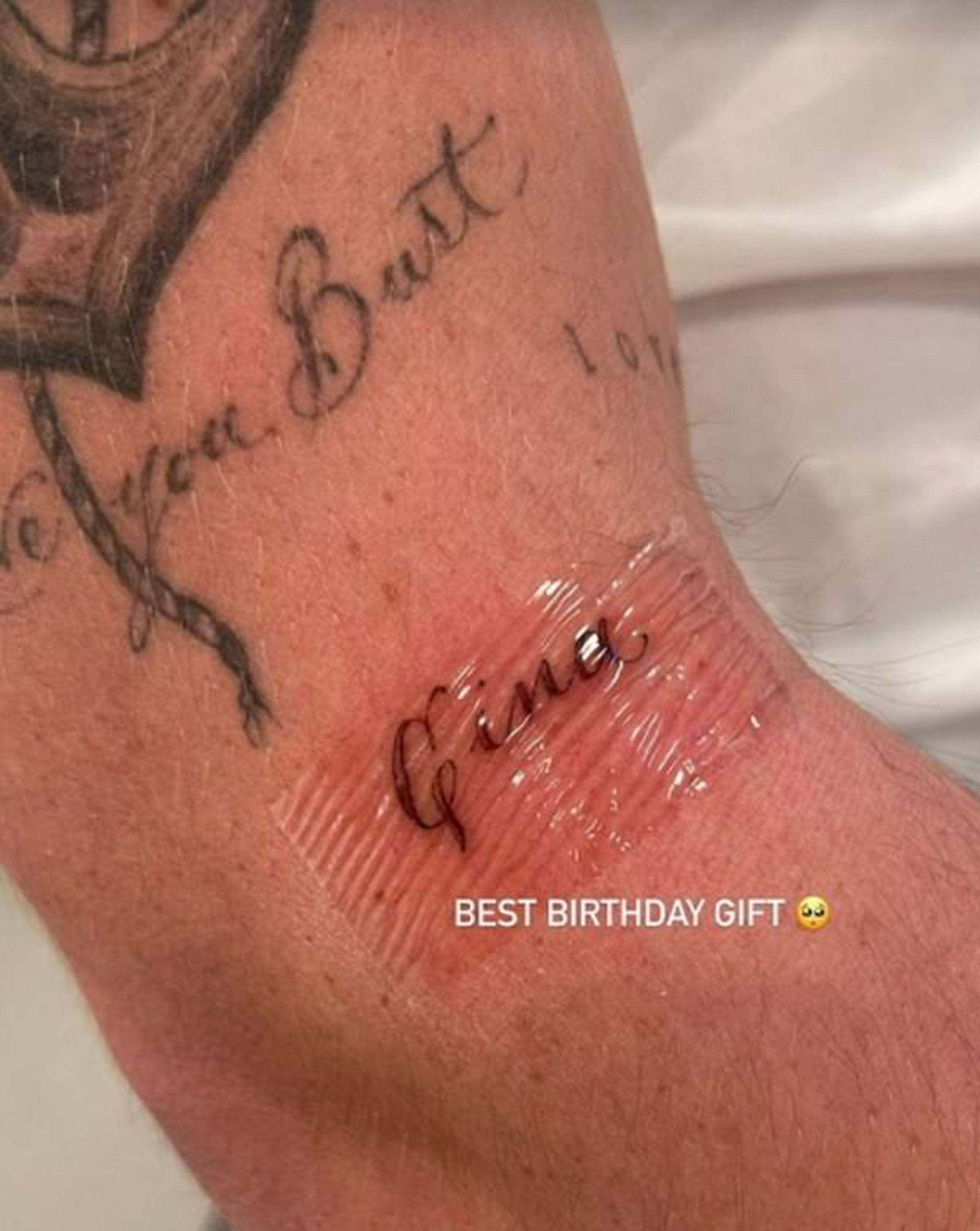 Brooklyn Beckham arm tattoo