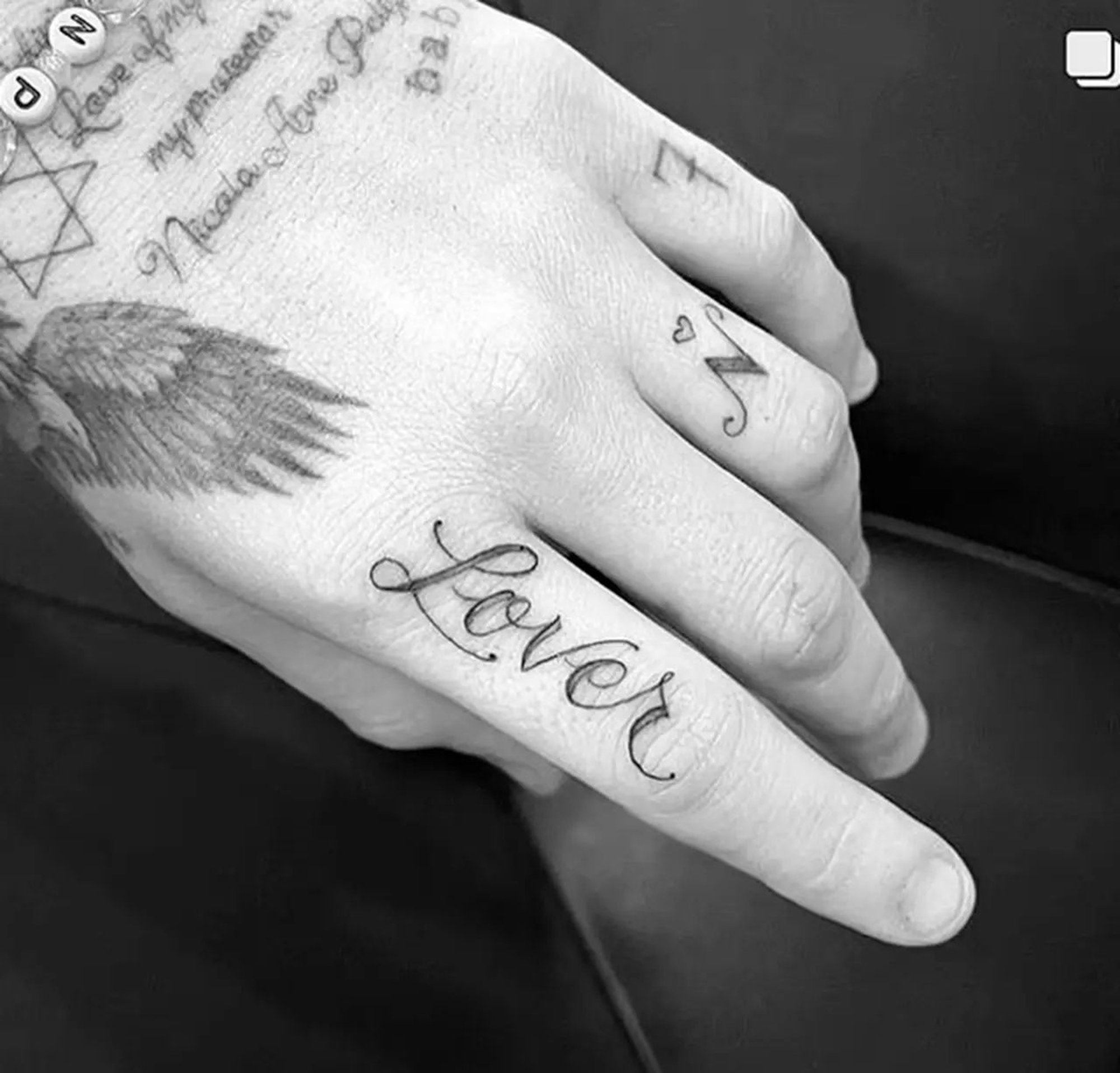 Brooklyn Beckham hand lettering tattoo