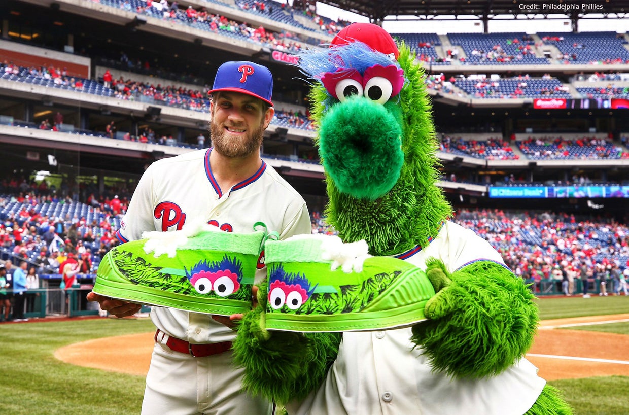 Bryce Harper in a contextual photograph: Harper and the Phillie Phanatic in a contextual team photograph; not tattoo evidence; not tattoo evidence