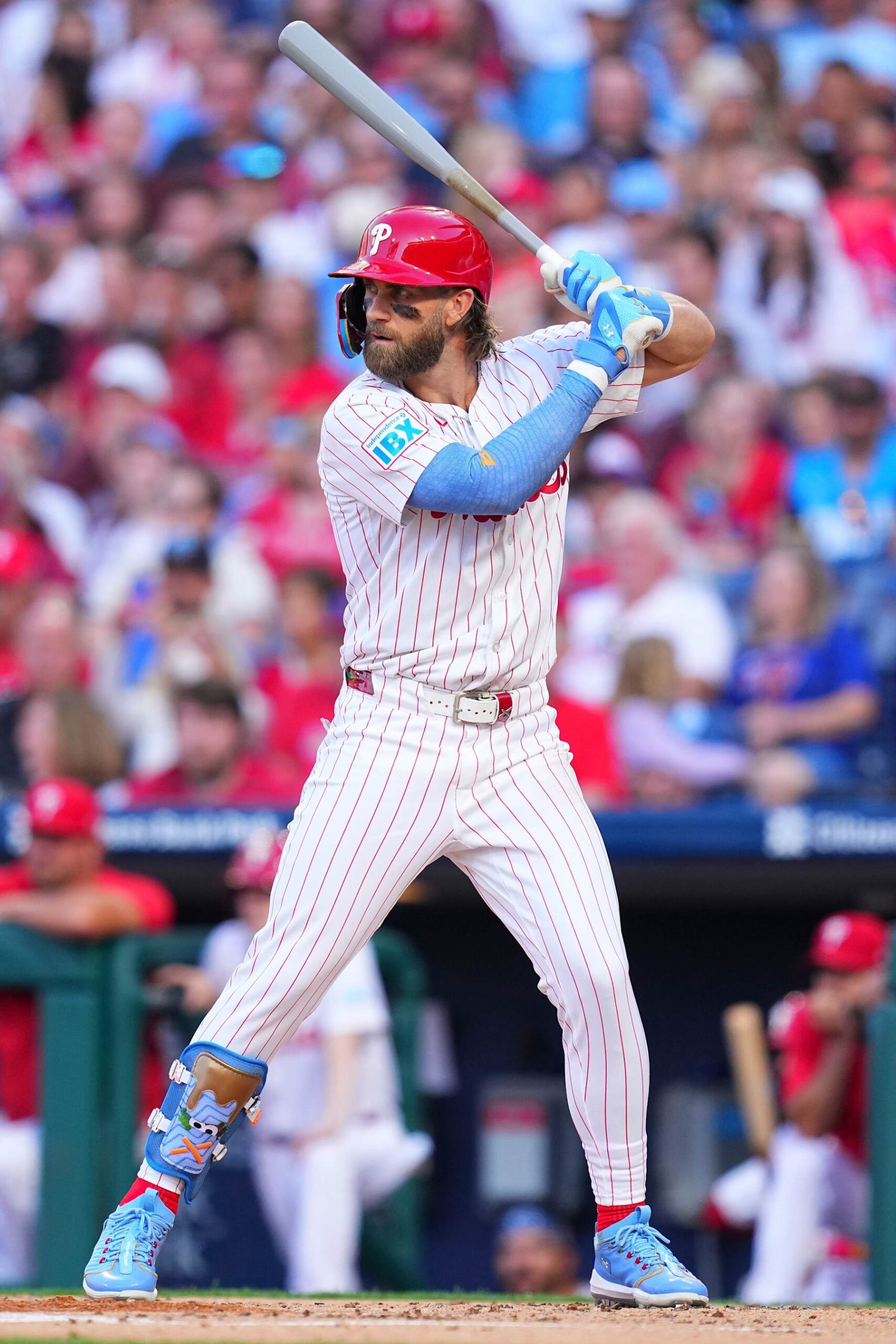 Bryce Harper in a contextual photograph: Harper in a contextual game-action photograph; not tattoo evidence; not tattoo evidence
