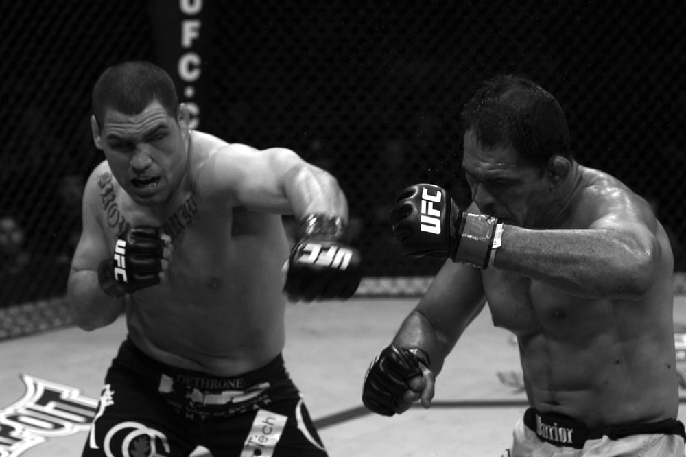 Cain Velasquez in a contextual photograph: The work inside the cage photograph; not tattoo evidence