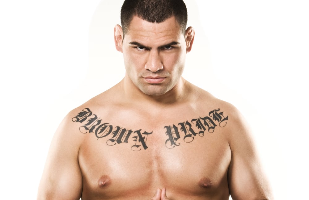 Cain Velasquez tattoos: Brown Pride chest lettering photograph