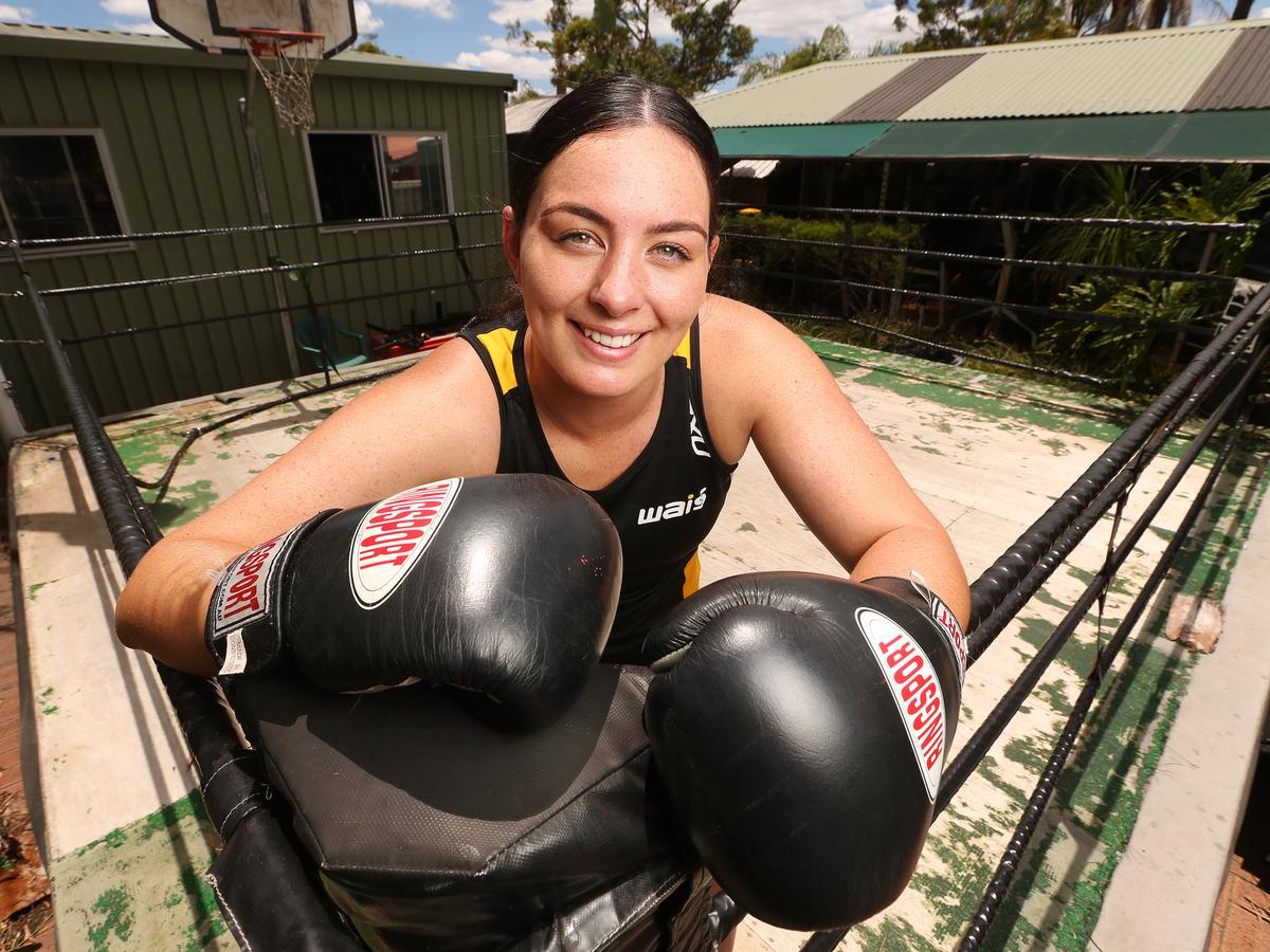 Caitlin Parker face-visible training-ring portrait Caitlin Parker portrait: face-visible training-ring portrait