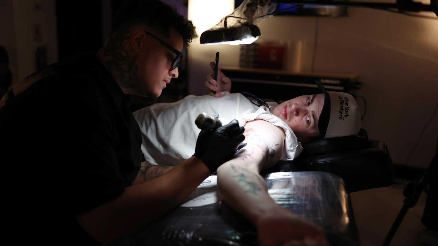 Cam Schlittler tattoos: Tattoo evidence: Schlittler during the Omar Cruz session.