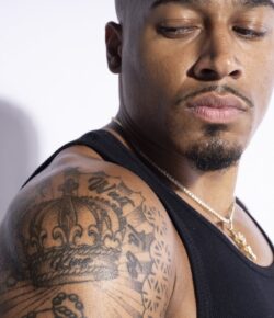 Carmelo Hayes Tattoos: Crown, Tupac Lettering and Personal Values
