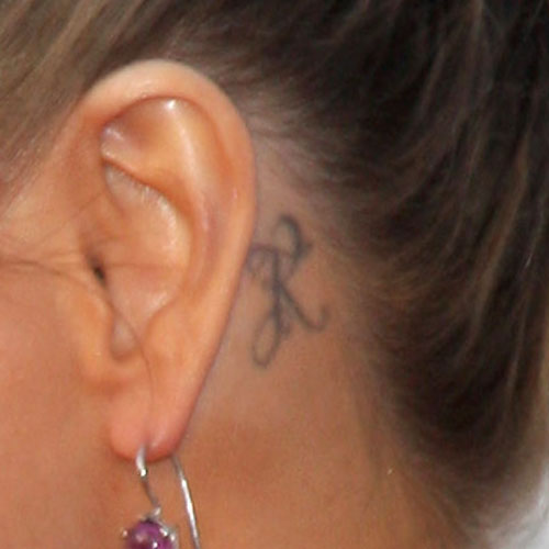 Carmen Electra behind-ear tattoo